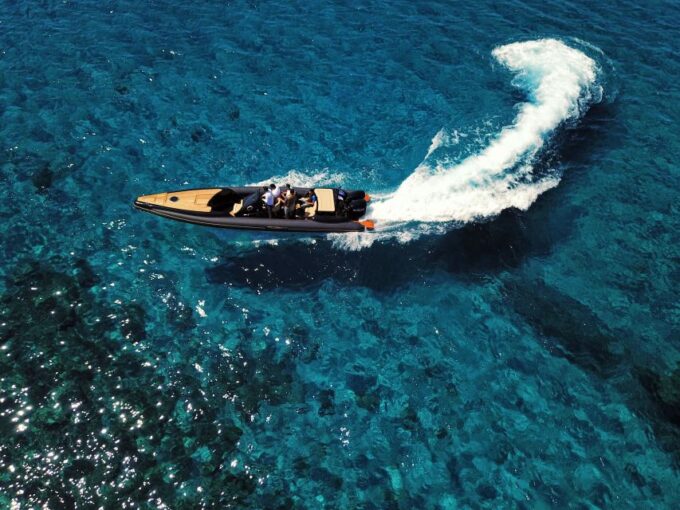 Private Boat Cruise to Delos and Rhenia Island - Savor Cool Beverages and Fruit