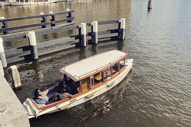 Private Boat Tour: Champagne Canal Cruise in Amsterdam - Tour Highlights