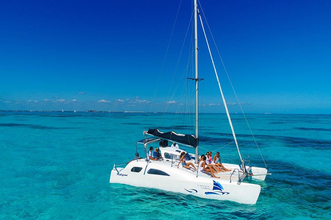 Private Cancun to Isla Mujeres Catamaran Cruise With Open Bar - Snorkeling the Coral Reef