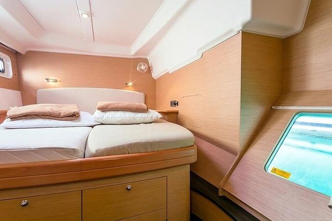 Private Catamaran Tour to the Maddalena Archipelago From Porto Rafael Palau - Crew and Hospitality