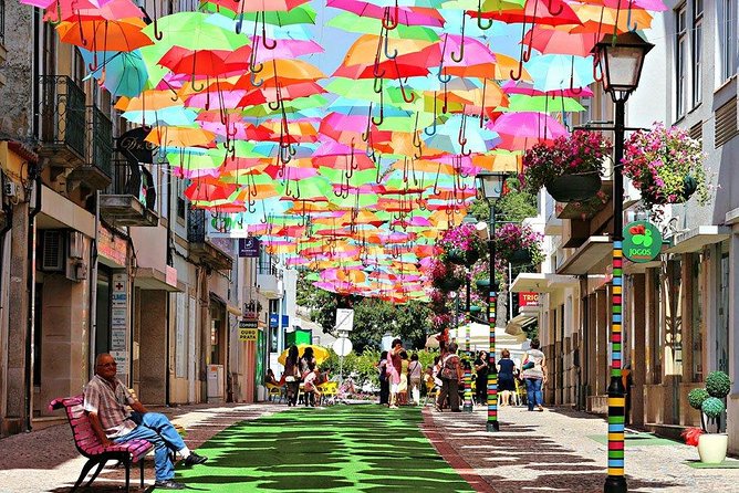 Private Coastal Journey (Obidos, Nazaré) to Águeda Art Umbrellas - Navigating the Canals of Aveiro