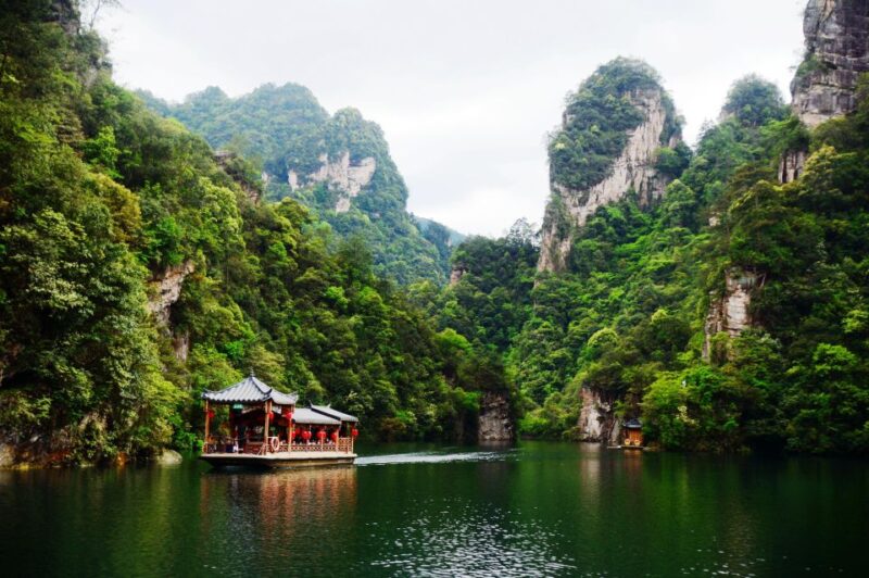 Private Day Tour to Yellow Dragon Cave & BaoFeng Lake - Boat Rides and Activities