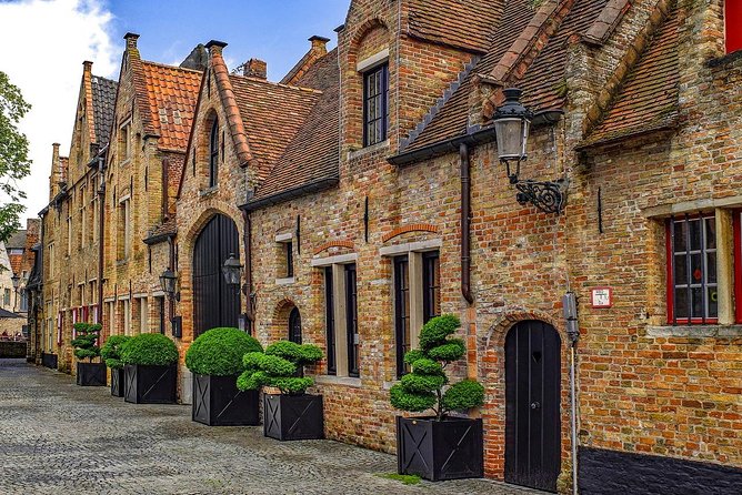 Private Full Day Sightseeing Tour to Bruges From Amsterdam - Tour Overview and Experience