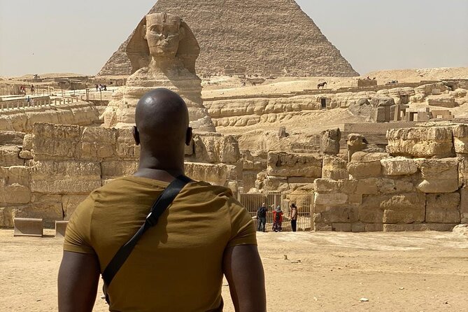 Private Giza Pyramids Tour, Sphinx With Camel Ride and Lunch - Encountering the Sphinx