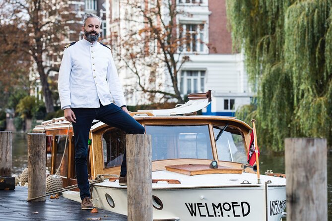 Private Guided Historic Amsterdam Canal Cruise in a Salon Boat - Explore Historical Districts