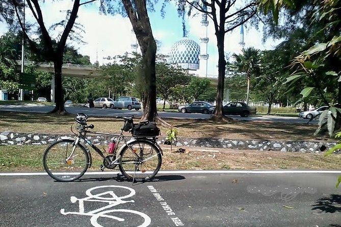 Private Half-Day National Botanic Garden Cycling Tour From Kuala Lumpur - Cancellation and Booking