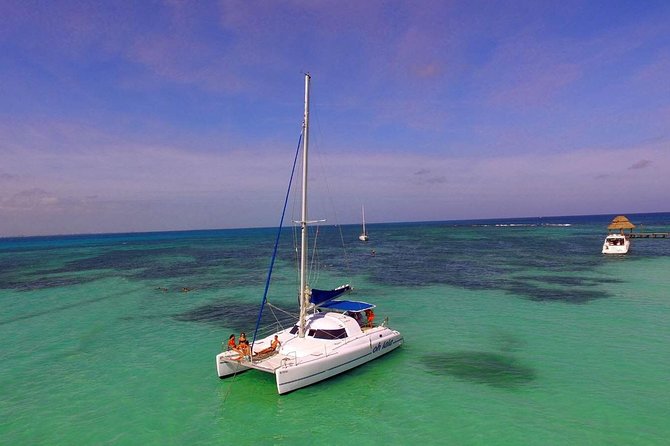 Private Isla Mujeres Catamaran Tour From Cancun With Open Bar - Restrictions and Requirements