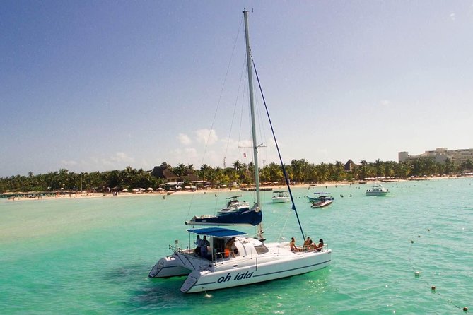 Private Isla Mujeres Catamaran Tour From Cancun With Open Bar - Snorkeling in Coral Reefs