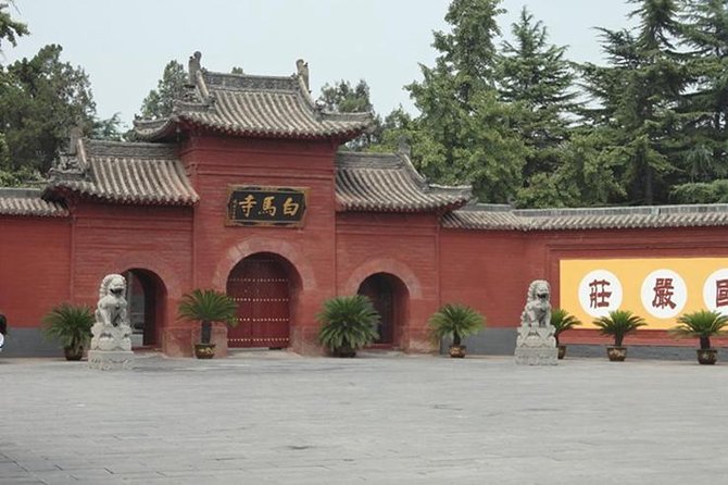 Private Luoyang Day Tour: Longmen Grottoes and White Horse Temple - Exploring Longmen Grottoes