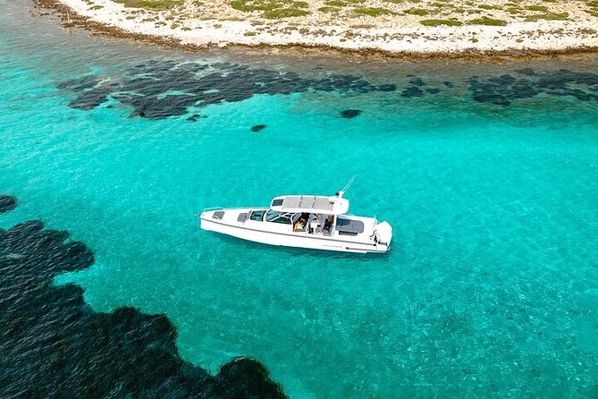 Private Luxury Boat Half Day Tour Paros Antiparos and Blue Lagoon - Discovering the Blue Lagoon