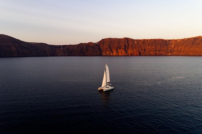 Private Luxury Caldera Cruise With a Rich BBQ Meal and Open Bar! - Booking and Cruise Itinerary Overview