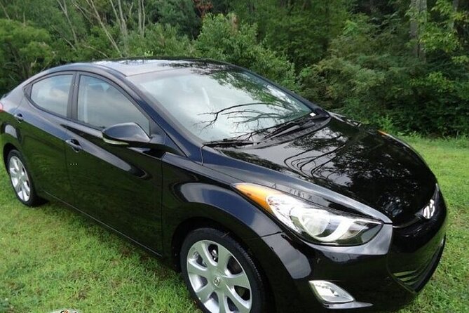 Private Roundtrip Sedan Airport Transfer to Paradise Island - Booking and Confirmation