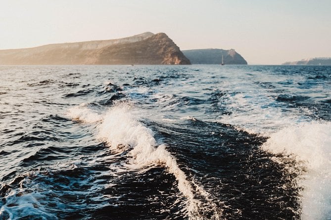 Private Sailing Catamaran in Santorini With BBQ Meal and Drinks - Accessibility and Cancellation Policy