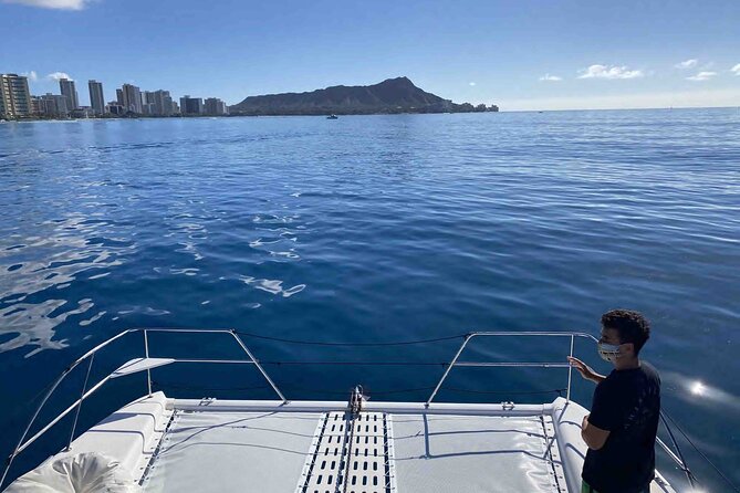 Private Sunrise Catamaran Cruise in Waikiki - Onboard Amenities and Facilities