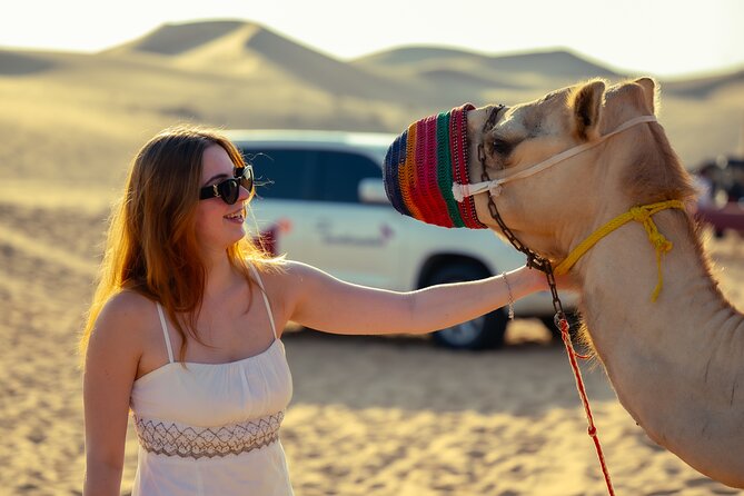 Private Sunrise & Dune Bashing in Abu Dhabi - Camel Ride and Sandboarding
