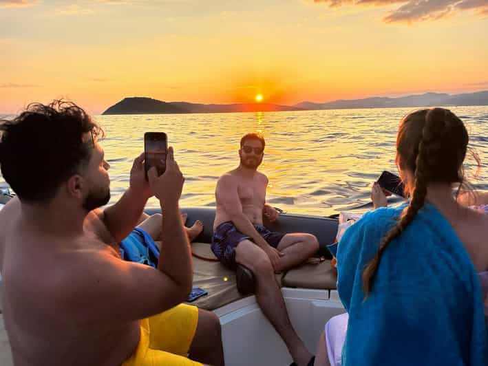 Private Sunset Boat Tour With Music and Wine - Inclusions