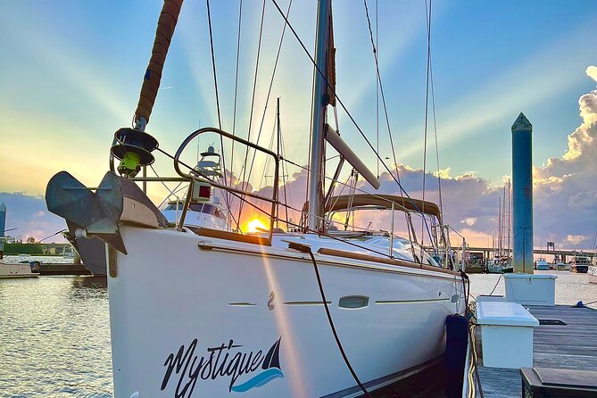 Private Sunset Sailing With Dolphin and History Tours on Mystique - Booking and Pricing Information