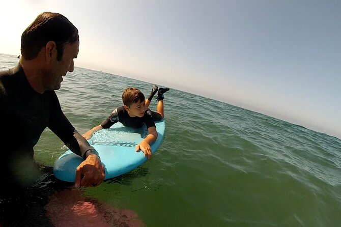 Private Surf Lesson in Huntington Beach - Bolsa Chica State Beach - Surfboard, Wetsuit, and Leashes Included