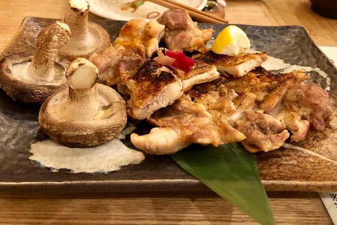 Private Tokyo Food Scene 6 Hour Experience: Depatika, Street Food, Izakaya - Traditional Izakaya Meal
