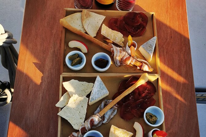 Private Tour on a Sailing Boat on Lake Maggiore With Aperitif and Music - Beverages and Exclusivity