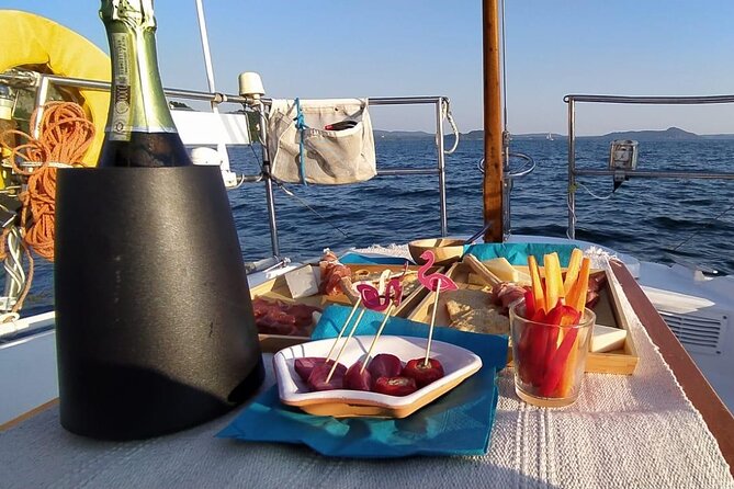 Private Tour on a Sailing Boat on Lake Maggiore With Aperitif and Music - Tour Confirmation and Information