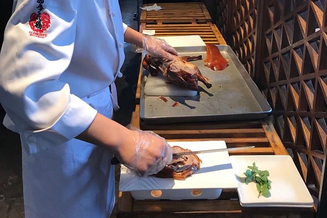 Private Tour to Pearl Market Acrobatic Show & Peking Duck Dinner - Guest Reviews