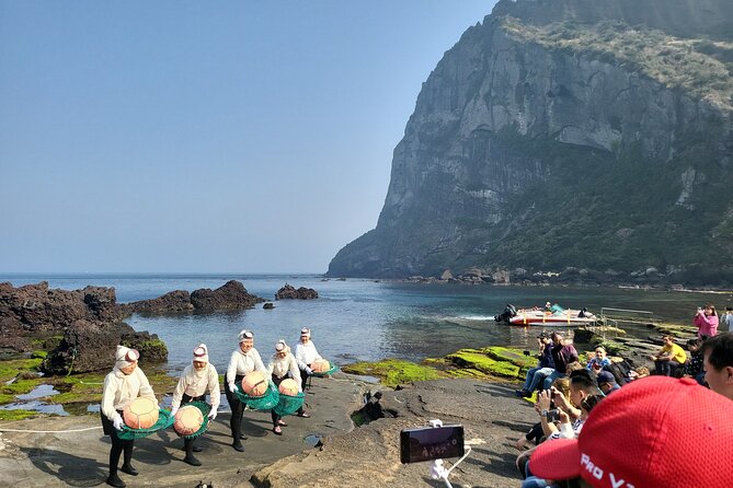 Private Tour Woman Diver Performance & Stone Park in Jeju Island - Seongsan Ilchulbong Highlights