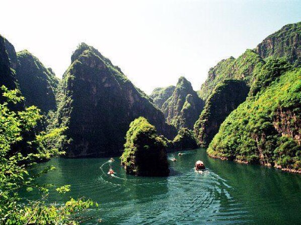 Private Transfer to Longqing Gorge and Guyaju Caves Excursion by English Driver - Key Points