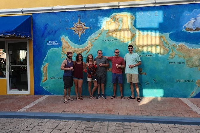 Providenciales Group Island Tour - Admiring Sapodilla Bay Hill Rock Carvings