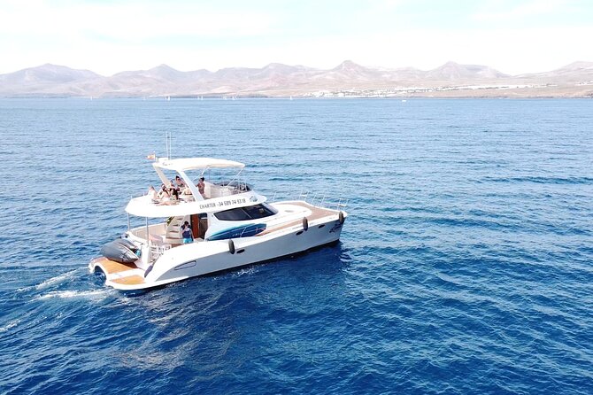 Puerto Del Carmen: Catamaran Trip With Water Sports - Overview of the Catamaran Experience