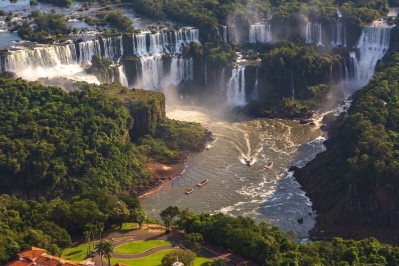 Puerto Iguazu: Iguazu Falls Boat Tour and Gran Aventura - Inclusions and Transportation