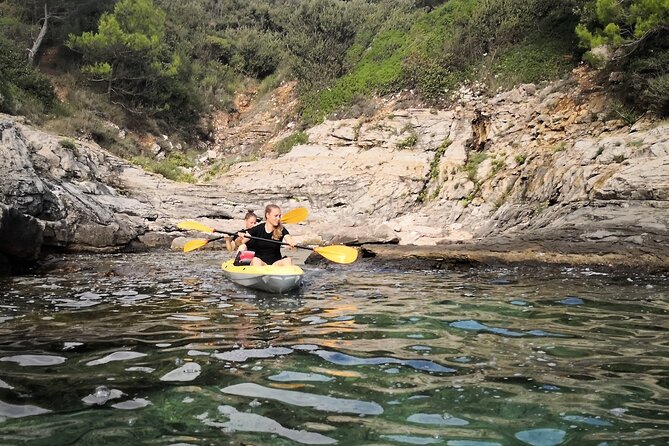 Pula: Cave Kayak Tour, Snorkeling and Cliff Jumping - Kayaking Through Caves