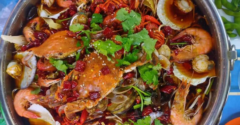 Qingdao Walking Night Tour With Seafood Hot Pot and Beer - Key Points