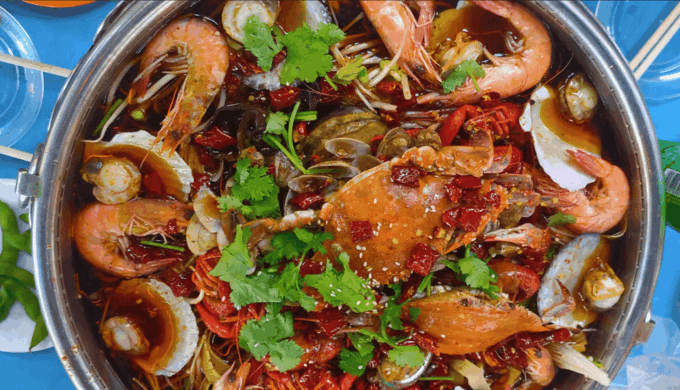 Qingdao Walking Night Tour With Seafood Hot Pot and Beer - Visit Taidong Night Market