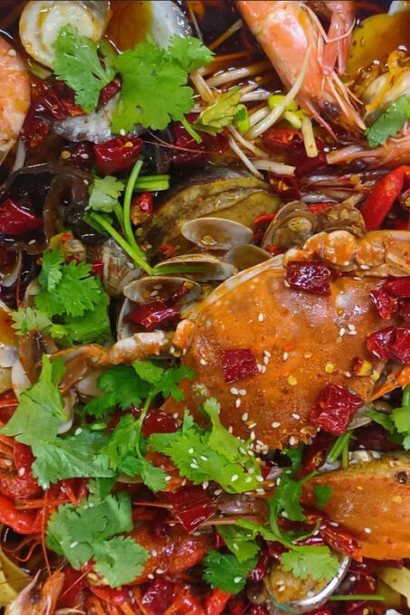 Qingdao Walking Night Tour With Seafood Hot Pot and Beer - Visit Wusi Square