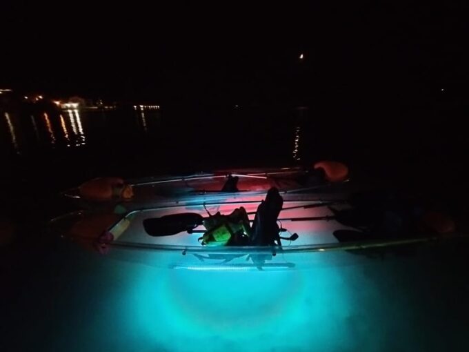 Rab: Night Adventures Illuminated Transparent Kayaks - Luminous Underwater Exploration