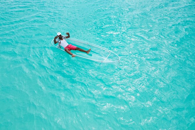 Radiant Solitude: Turks & Caicos Clear Kayak Solo Portraits - Navigating the Serene Turquoise Waters