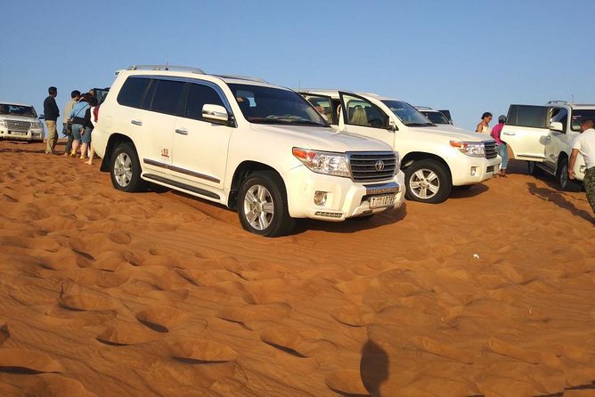 Red Dunes Dubai Desert Safari With Live Show, Sandboarding & BBQ - Cultural Experiences and Performances