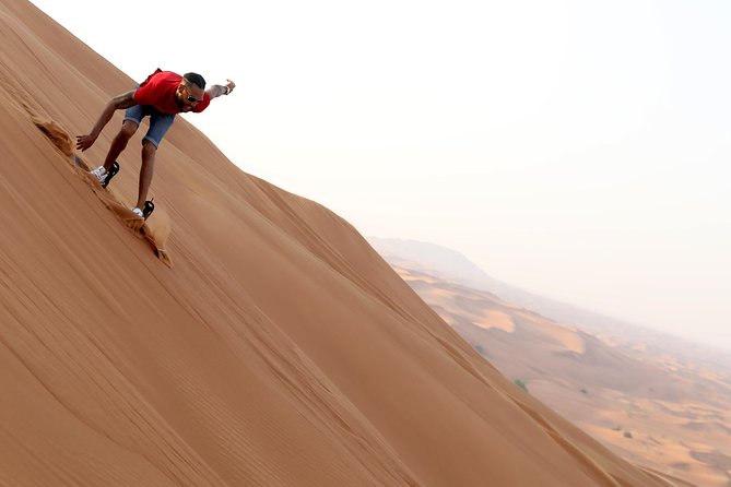 Red Dunes Quad Bike, Camel Ride+Sand Surfing, BBQ Dinner @ VIP CAMP - Pickup and Transportation