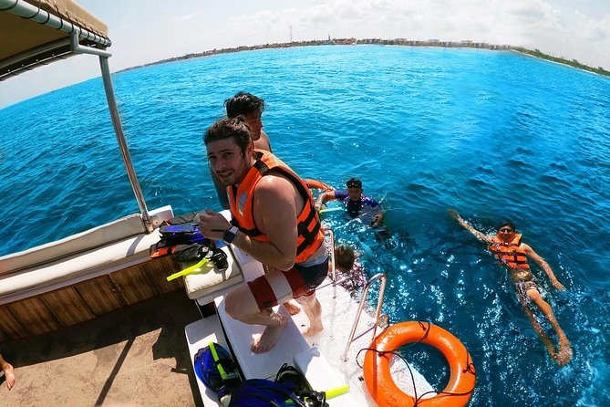 Reef Snorkeling in National Park From Cancun With Beachside Lunch - Age Limits and Accessibility