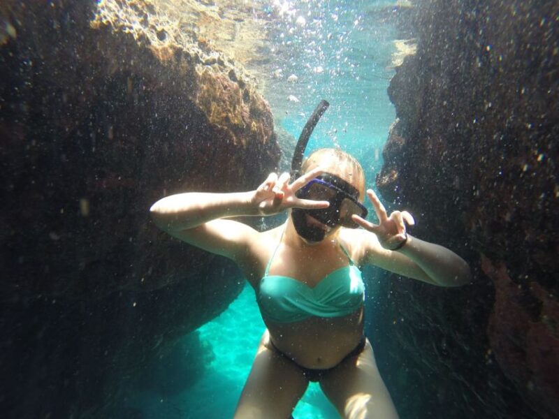Rhodes: Beach Cruise With Swimming, Meal, & Unlimited Drinks - Onboard Activities and Amenities