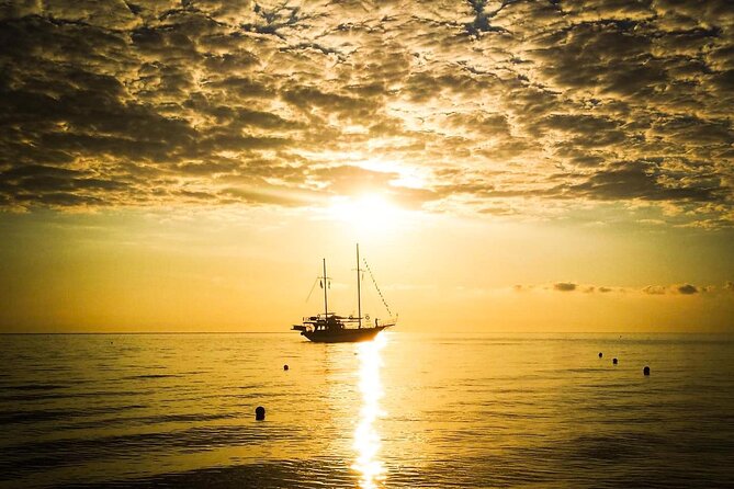 Rhodes by Sunset Cruise With Unlimited Drinks and Snacks - Key Points