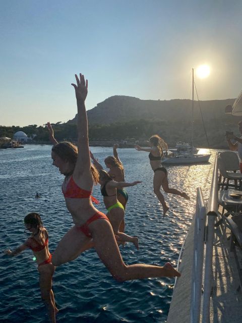 Rhodes: Sunset Cruise W/ Gourmet Dinner, Drinks & Live Music - Booking and Cancellation Policy