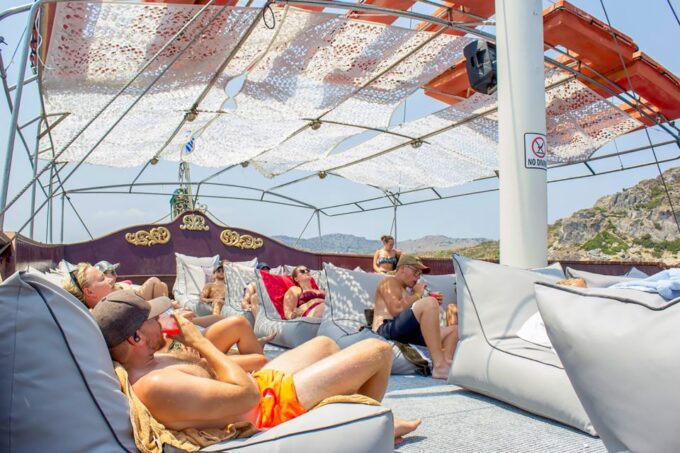 Rhodes: Sunset Cruise With Greek BBQ and Unlimited Drinks - Dining and Refreshments