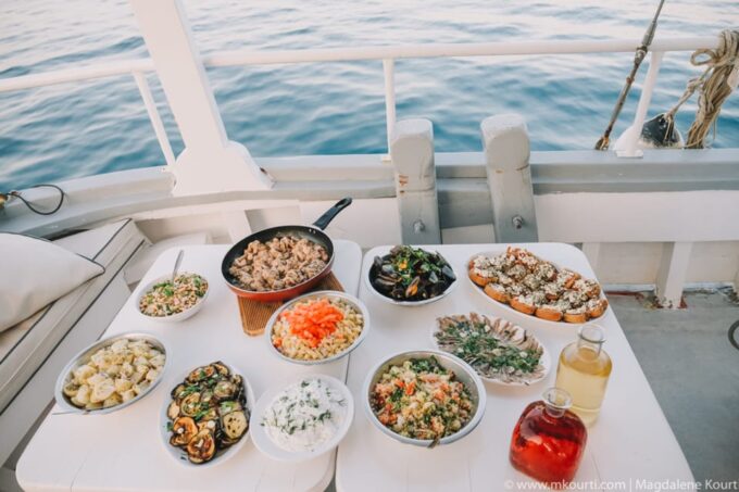 Rhodes: Sunset Cruise With Live Music, Wine & Greek Buffet - Booking and Availability