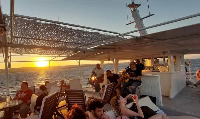 Rhodes: Sunset Cruise With Live Music, Wine & Greek Buffet - What to Bring