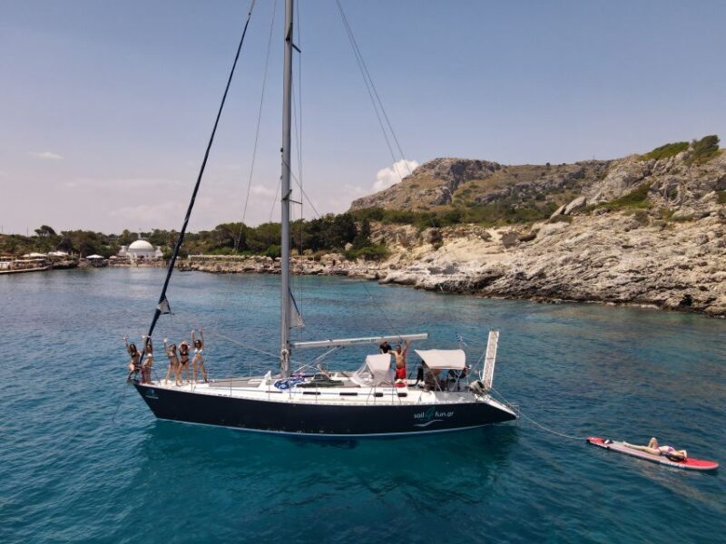 Rhodes Town: Private Sailing Cruise With Swim Stops & Meal - Exploring Antony Quinn Bay