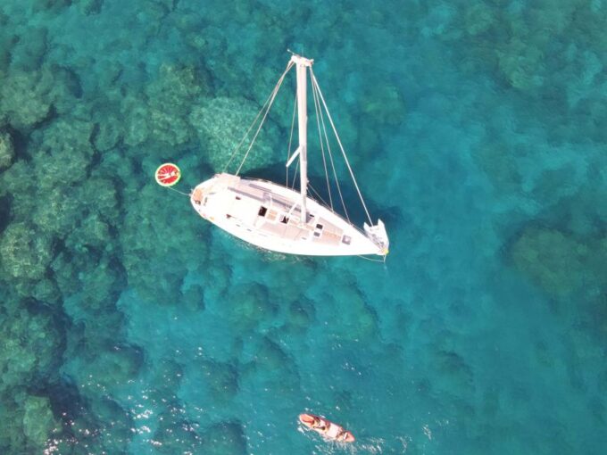 Rhodes Town: Private Sailing Cruise With Swim Stops & Meal - Onboard Experience