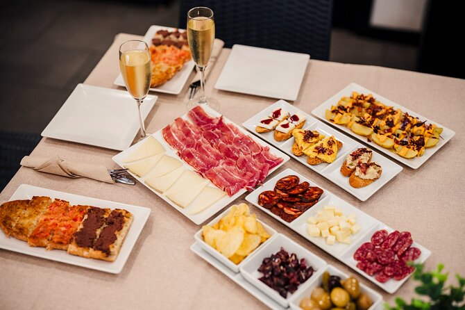 Sagrada Familia Jamon & Tapas Tasting Experience - Booking Information