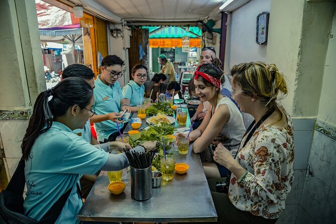 Saigon After Dark With Seafood, Beer & Live Music Bar - Sipping Refreshing Drinks